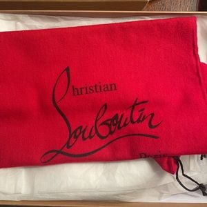 Christian Louboutin red bottoms.